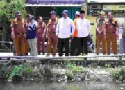 Pj Bupati Bekasi Dedy Supriyadi Tinjau Normalisasi Kali Cilemahabang