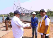 Pj Bupati Bekasi Targetkan Pembangunan Jembatan Citarum di Pantai Bakti Rampung Akhir Tahun